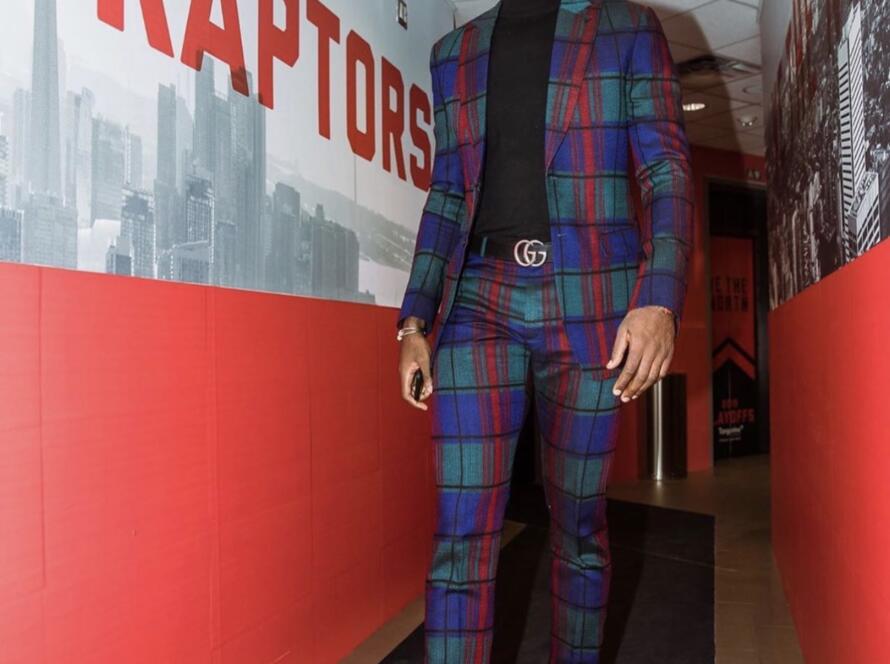 Serge Ibaka walking out of Toronto raptors tunnel in custom empire suit
